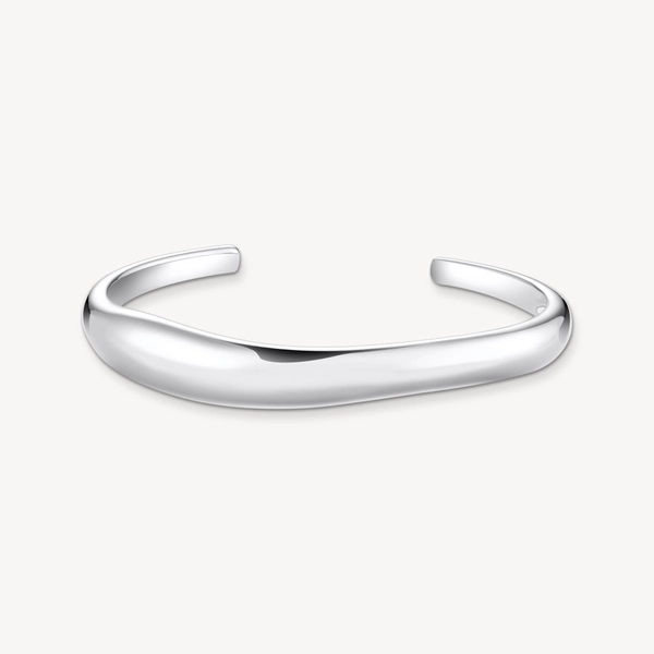 Silver bangle in organic shape
