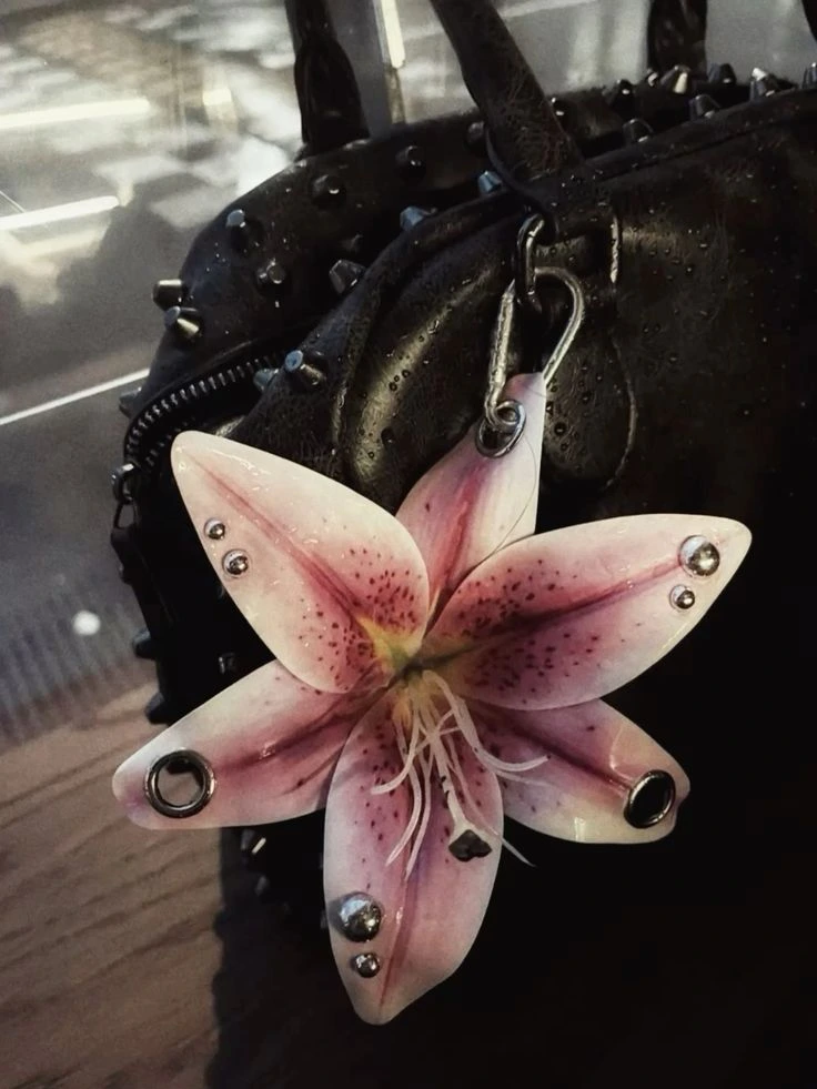 Pierced Lily Charm