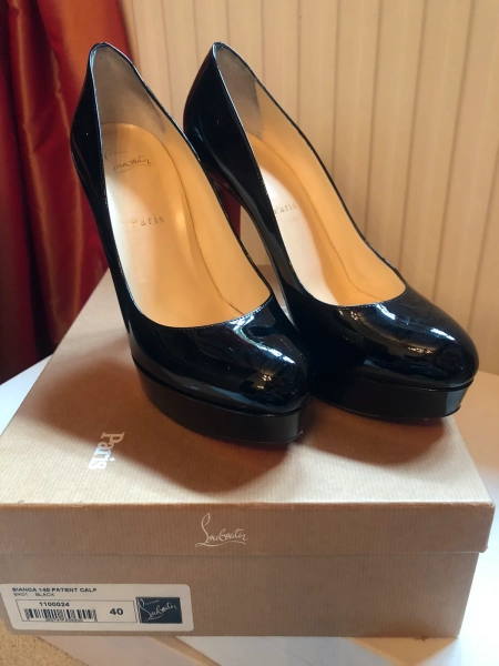 Christian Louboutin black patent shoes