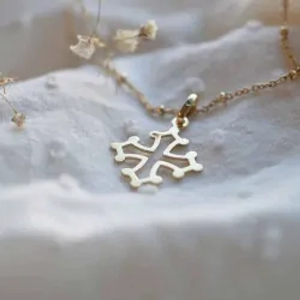 Pendentif Croix solidarité ajourée