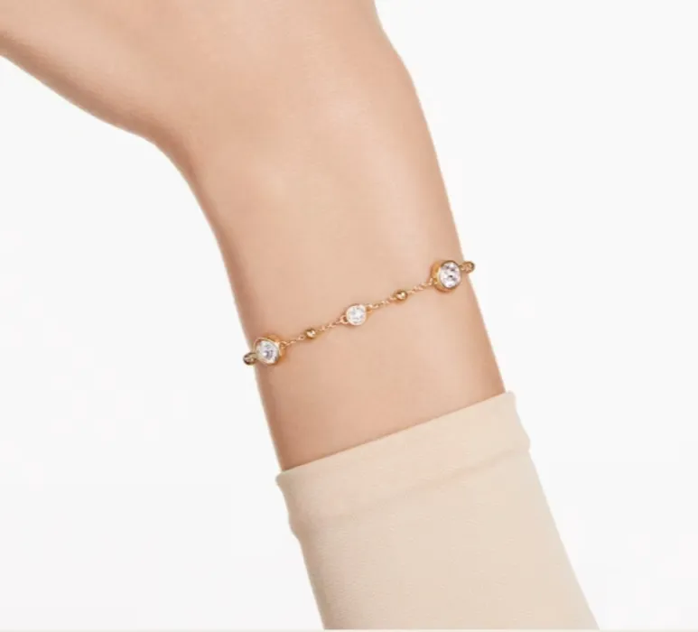 Imber bracelet Round cut, Scattered design, White, Gold-tone plated