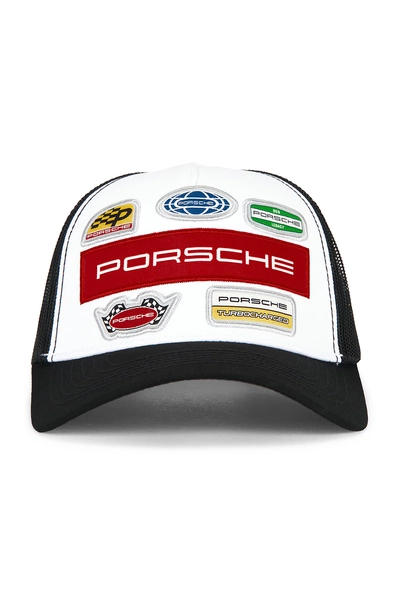 Porsche x Revolve Trucker Hat in Black