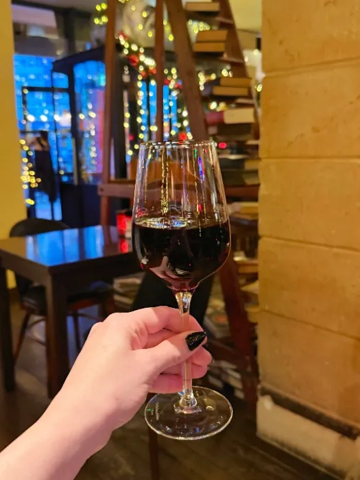 Cheers! Buy The Lady Lux a glass of red wine