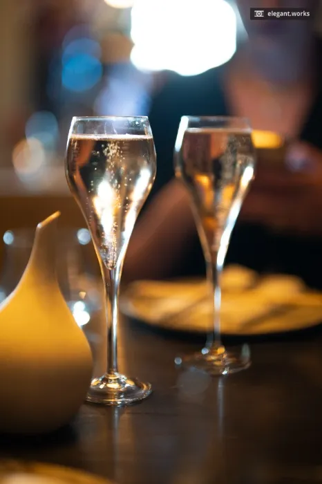 Buy a glass of Champagne for The Lady Lux