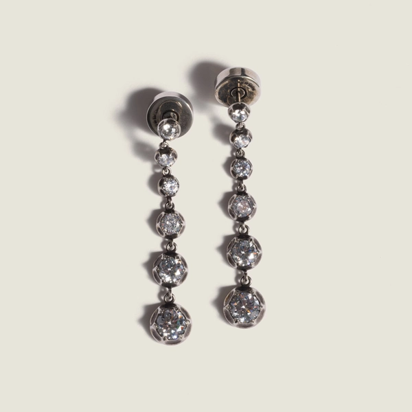 Metal pendant earrings with crystals