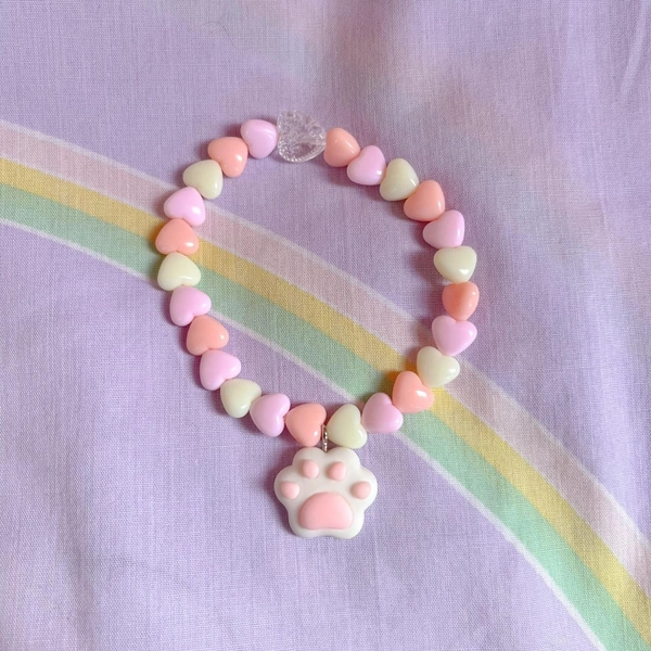 cute pastel pink heart bead bracelet with a paw...