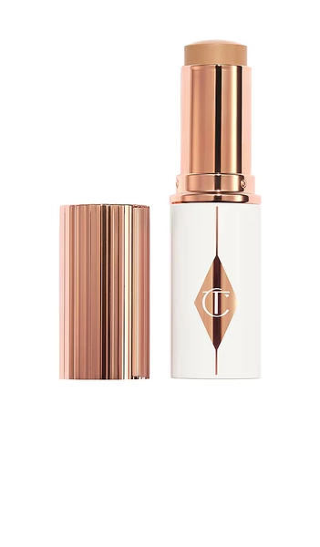 Charlotte Tilbury Unreal Skin Sheer Glow Tint Hydrating Foundation Stick in 6 Medium.