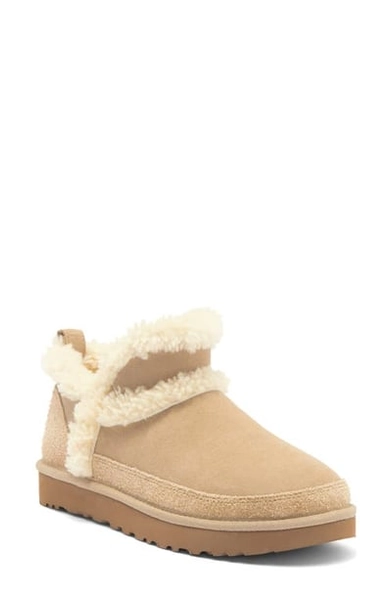UGG(r) Classic Ultra Mini Spillseam Genuine Shearling Bootie in Mustard Seed at Nordstrom, Size 6