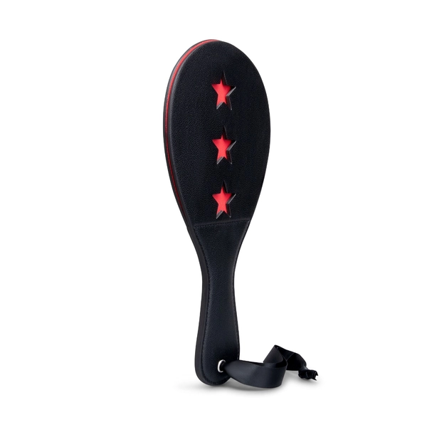 star-patterned spanking paddle