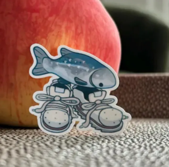 shoes fish. fish with the shoes on him