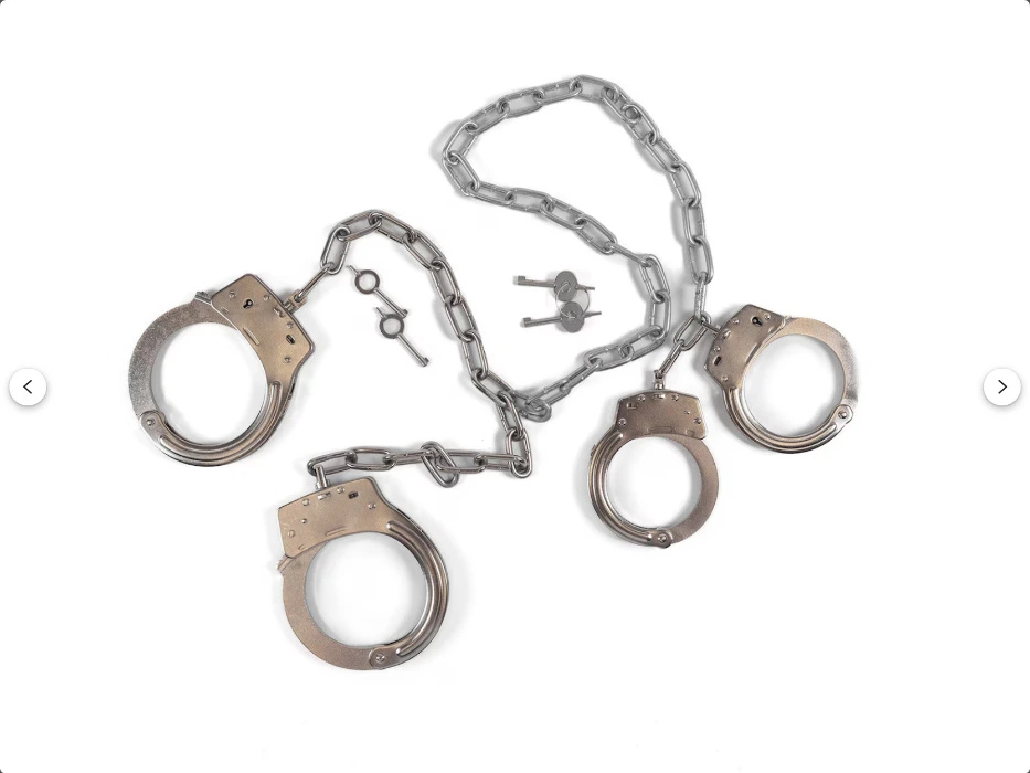 Heavy hand and leg irons with connecting chain