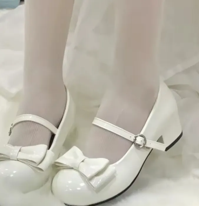 White Kitten Heels