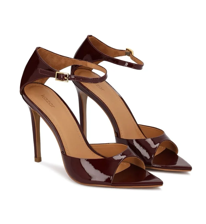 Elegant burgundy patent leather sandals on a slender stiletto heel