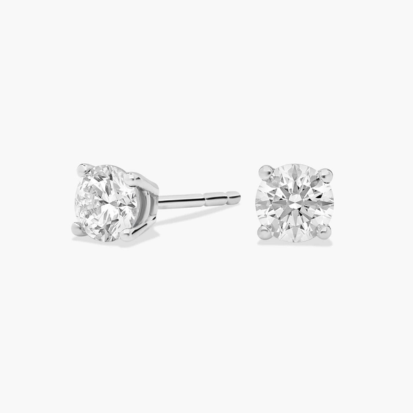 Four Prong Round Brilliant Diamond Stud Earrings In 14K White Gold (1/2 Ct. tw. - H-I / SI1-SI2)