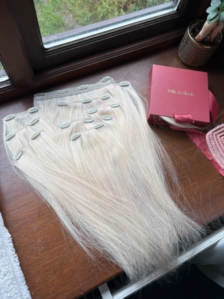 Ice blonde clip in human hair extensions