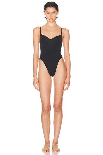 SKIMS Seamless Sculpt Thong Bodysuit in Black