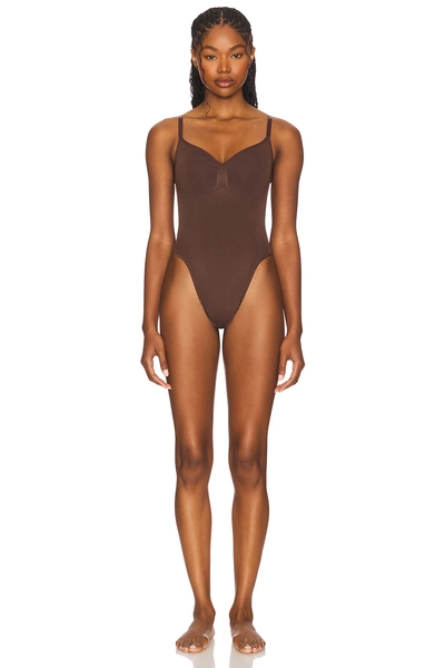 SKIMS Seamless Sculpt Thong Bodysuit in Brown