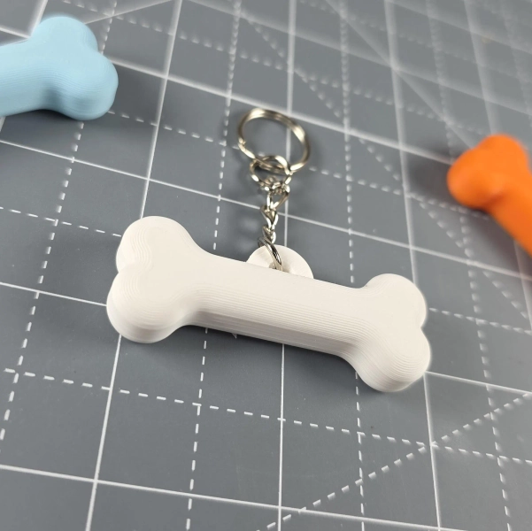Dogbone Keychain - Multi-colored furry dogbone for your keys!