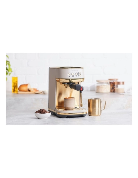 The Bambino Plus Coffee Machine in Almond Nougat Brass