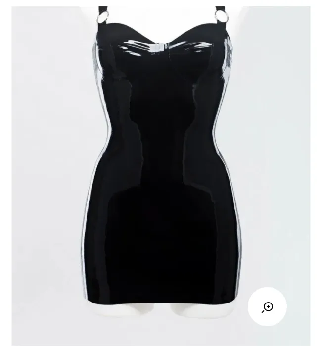 Latex dress decorated with metal rings