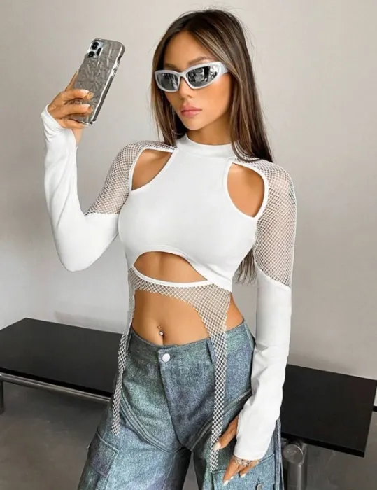 White rave top with long sleeves and lace details