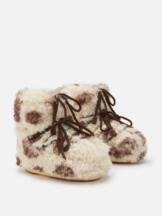 COW PRINT CURLY MOON BOOTS