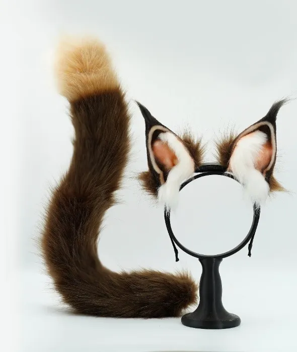 Movable cat ear with tail